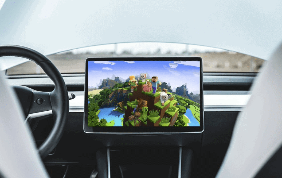 Tesla will now stop people from playing games while moving