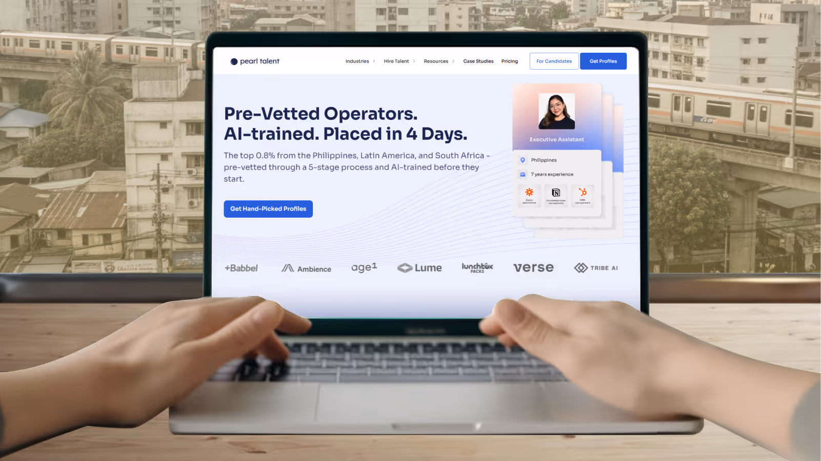 Person using a laptop showing Pearl Talent website homepage highlighting pre-vetted, AI-trained operators placed in 4 days.