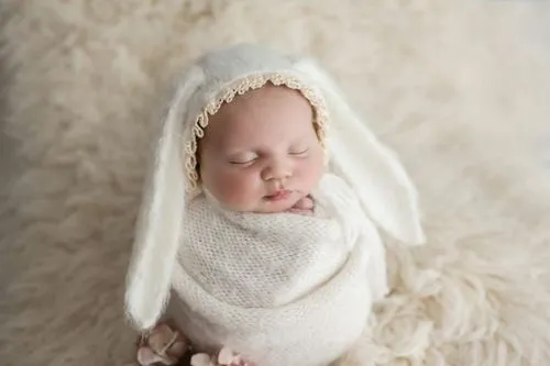 Baby ready for photoshoot with rabbit hat