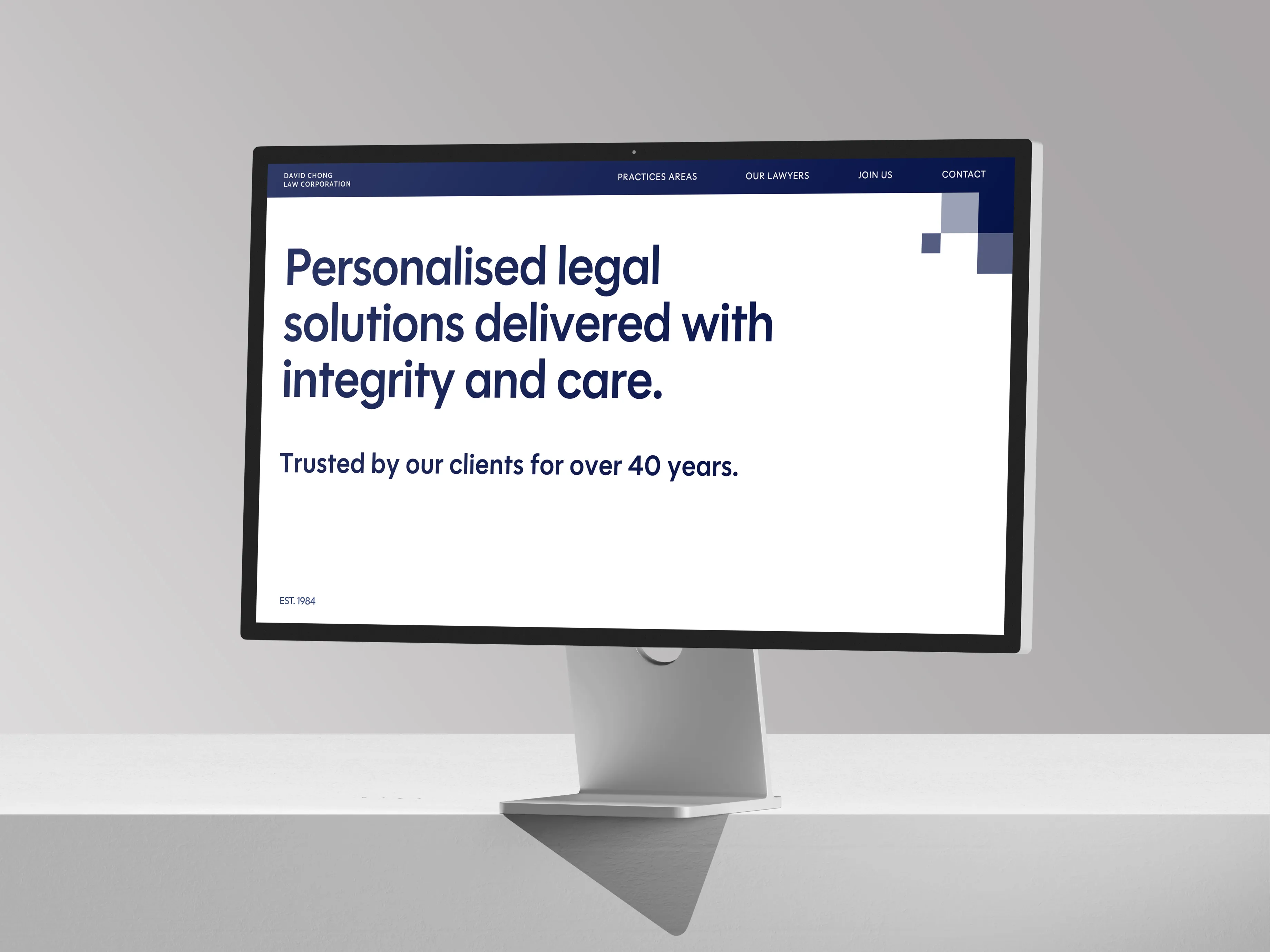Image of a laptop showcasing David Chong Law Corporation homepage.