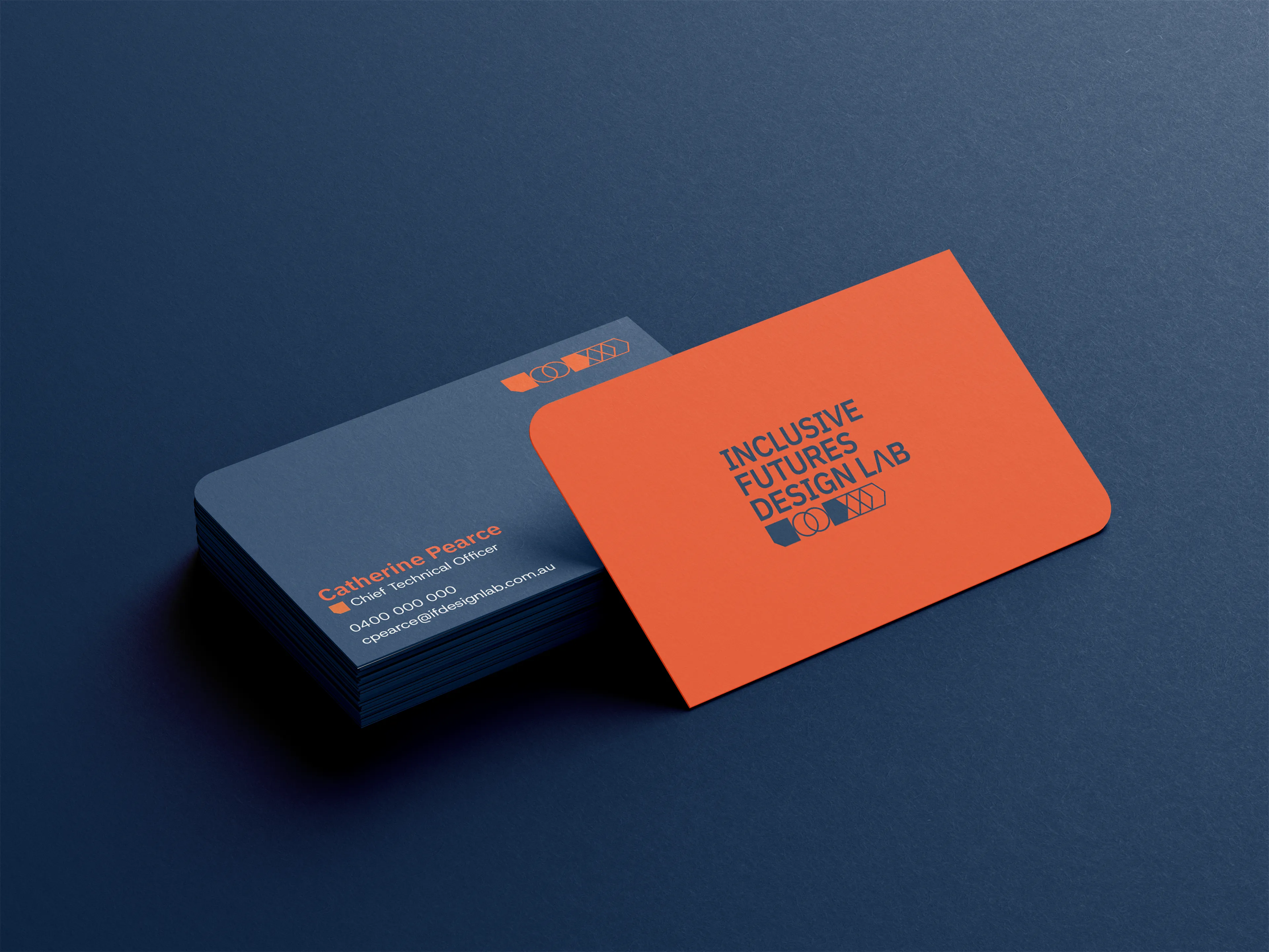 A mockup of business cards for Inclusive Futures Design Lab.