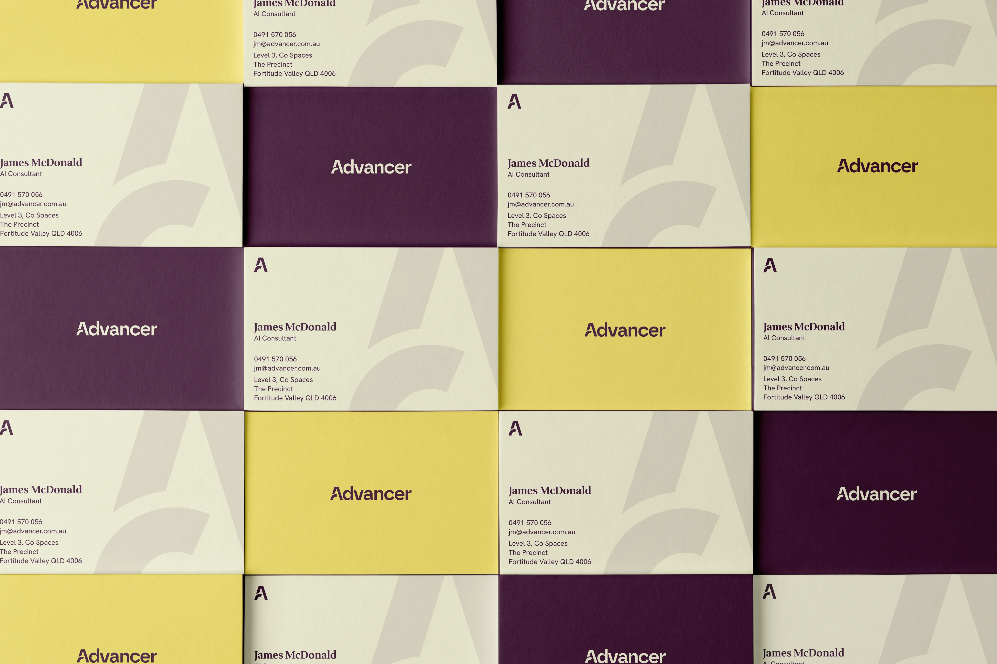Grid of Advancer business cards showing name James McDonald, AI Consultant, contact details, and logo.