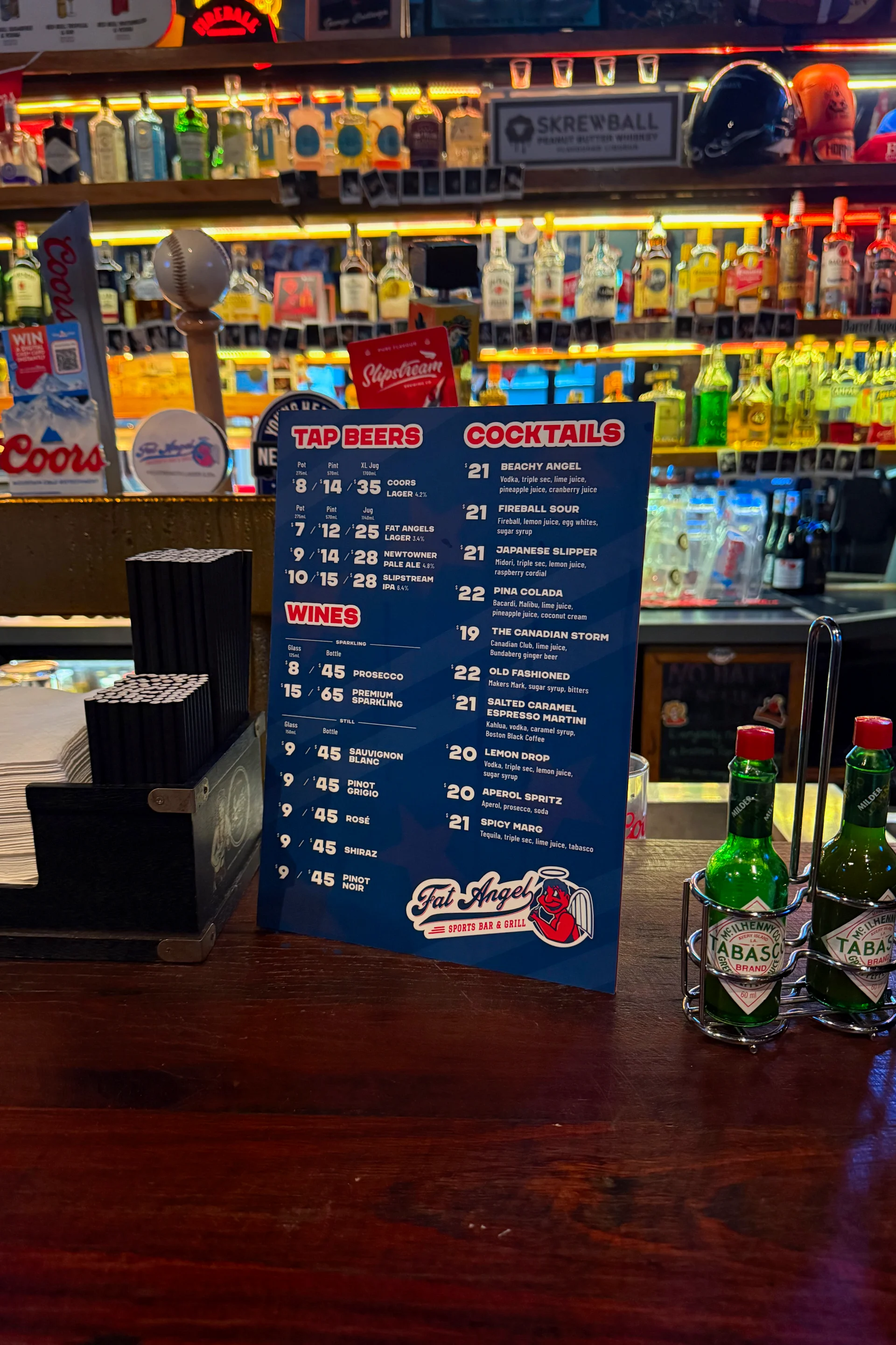 A photo of the drinks menu for Fat Angel Sports Bar and Grill.
