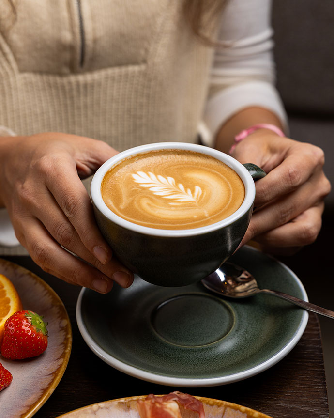 The main dining hall with several tables and chairs