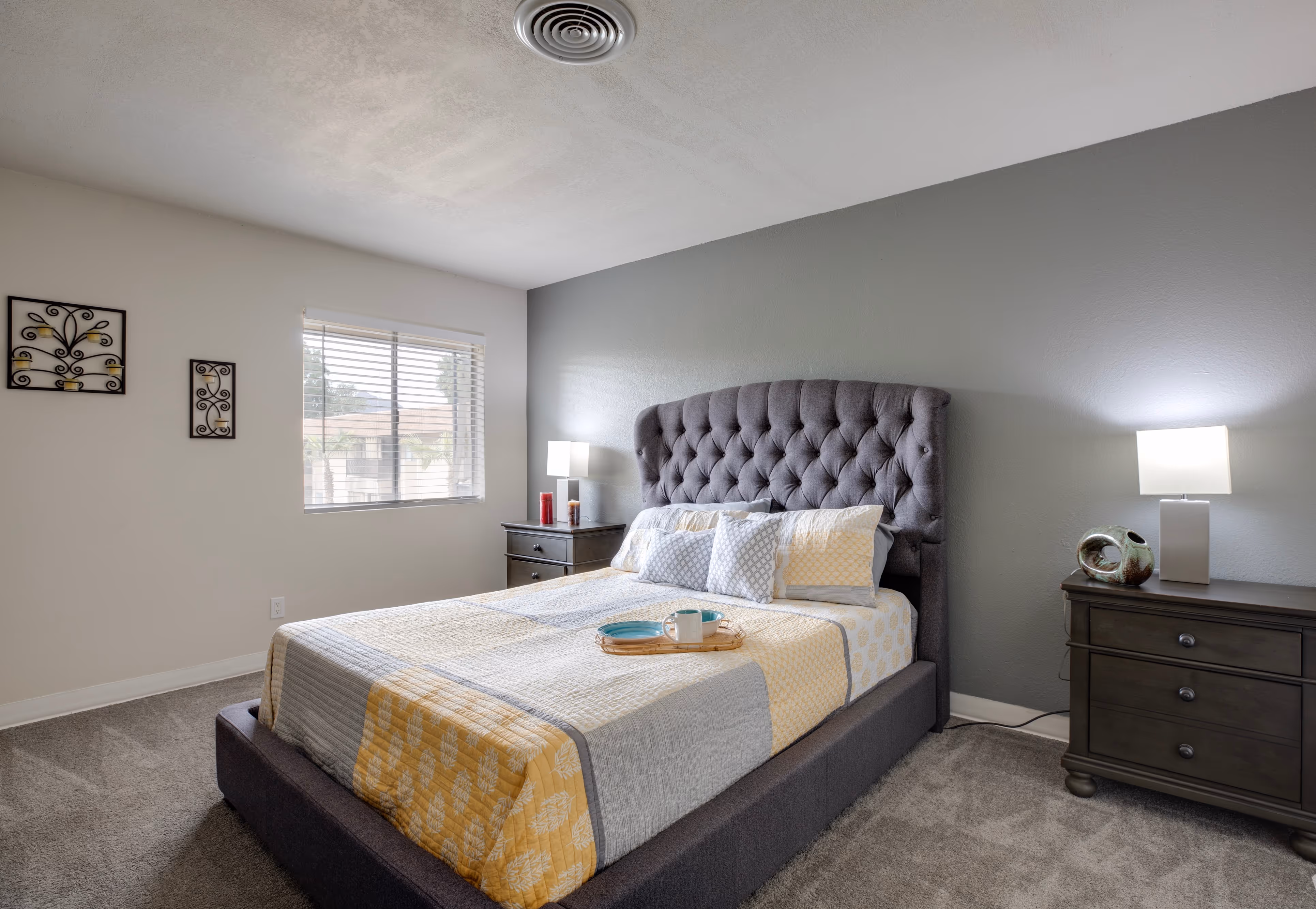 Bedroom with yellow bedspread