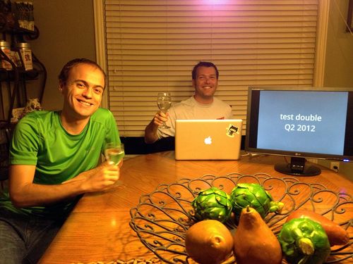 Justin Searls and Todd Kafuman sitting at a table during 2012 retreat