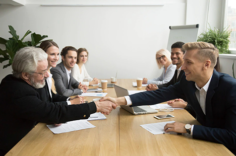 people signing insurance policies