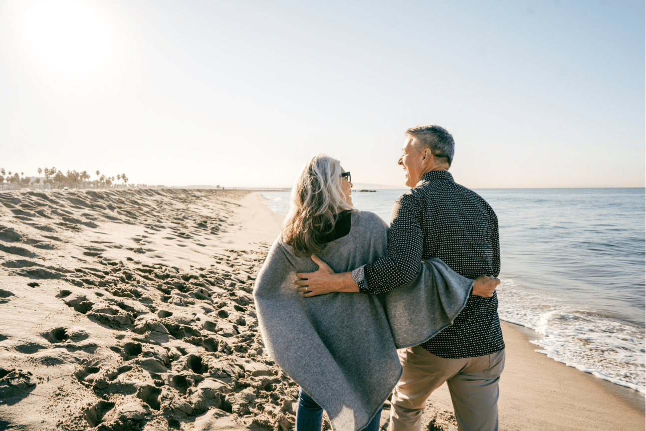 happy people walking in the beach 