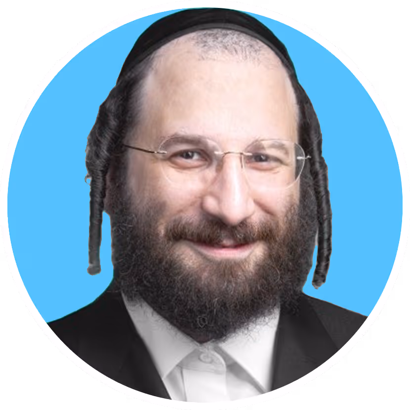 Smiling man with glasses, beard, and side curls wearing suit and white shirt on blue background.