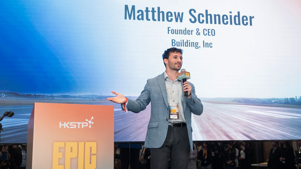 Matthew Schneider delivering opening remarks at EPIC 2025 in Hong Kong