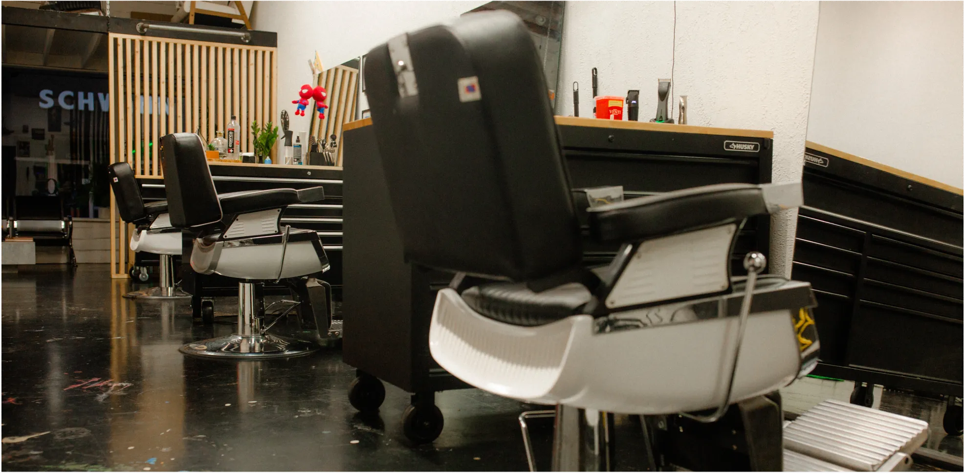 Close-up of a professional barber chair and workstation inside a Lakeland, Florida barbershop studio