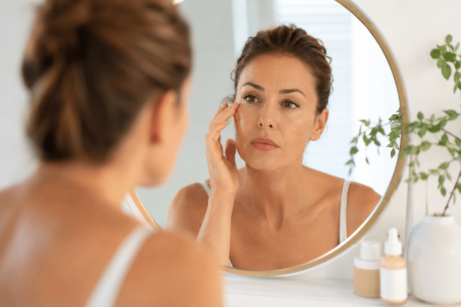 Client receiving anti aging microneedling treatment in Queen Creek, Arizona to improve skin firmness and texture