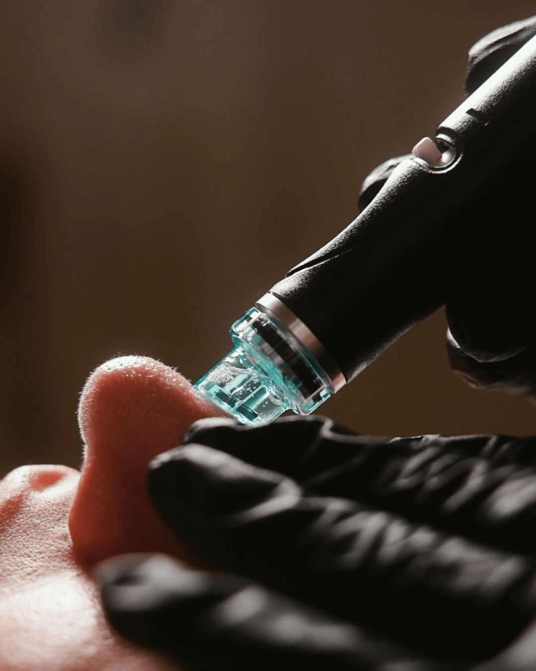 Esthetician performing dermaplaning treatment before a hydrafacial in Queen Creek, Arizona 