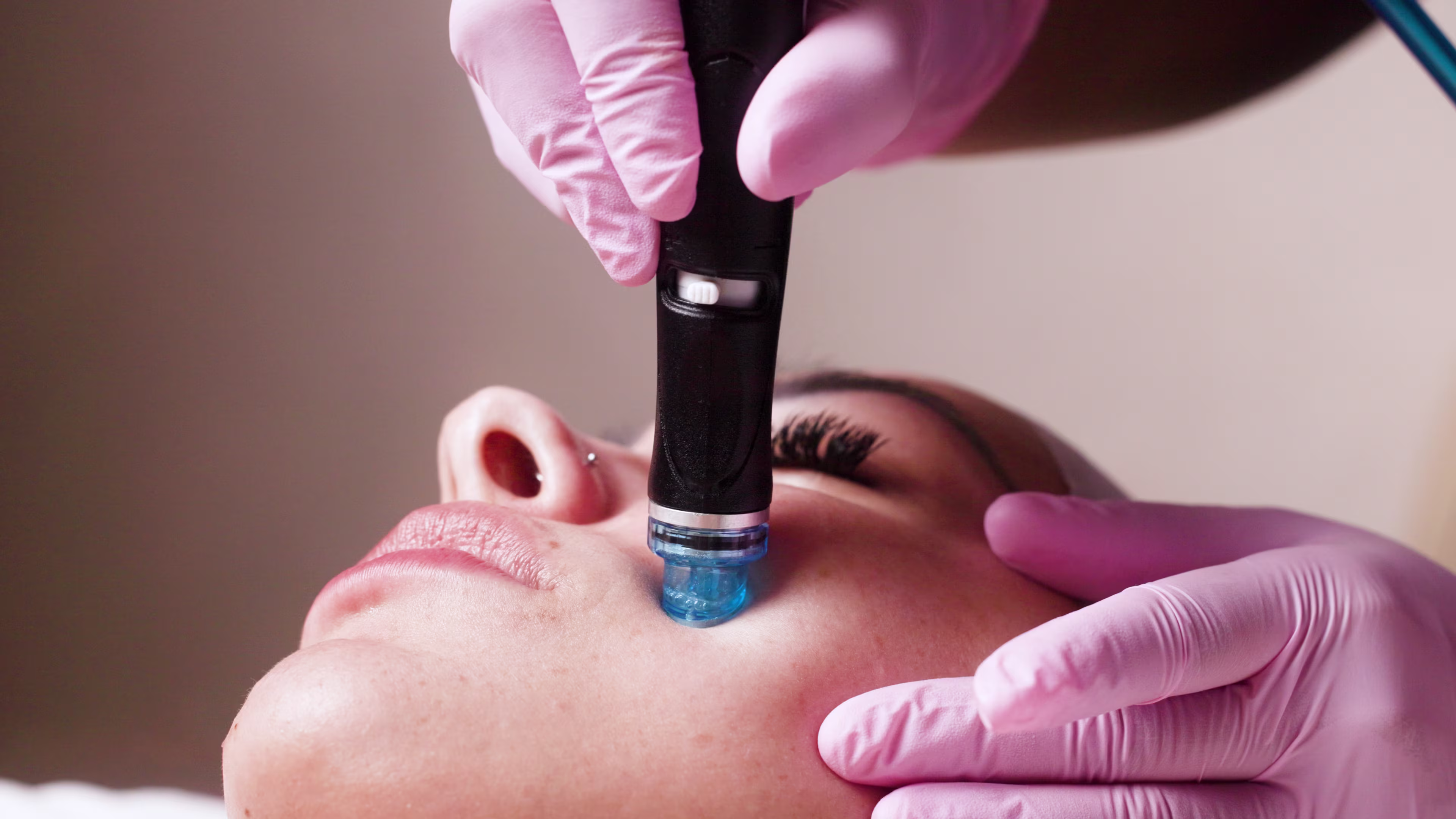 Esthetician consulting with a client about the best skin treatment options at a Queen Creek skincare studio
