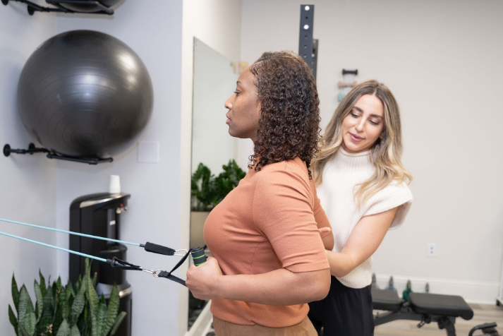 Patient working with a provider at a physical therapy clinic in Metairie, LA receiving manual therapy treatment during a one-on-one session
