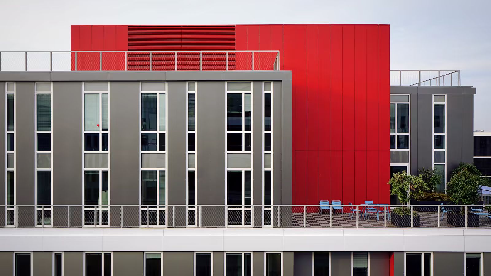 A collection of connected buildings expressing a cohesive brand architecture