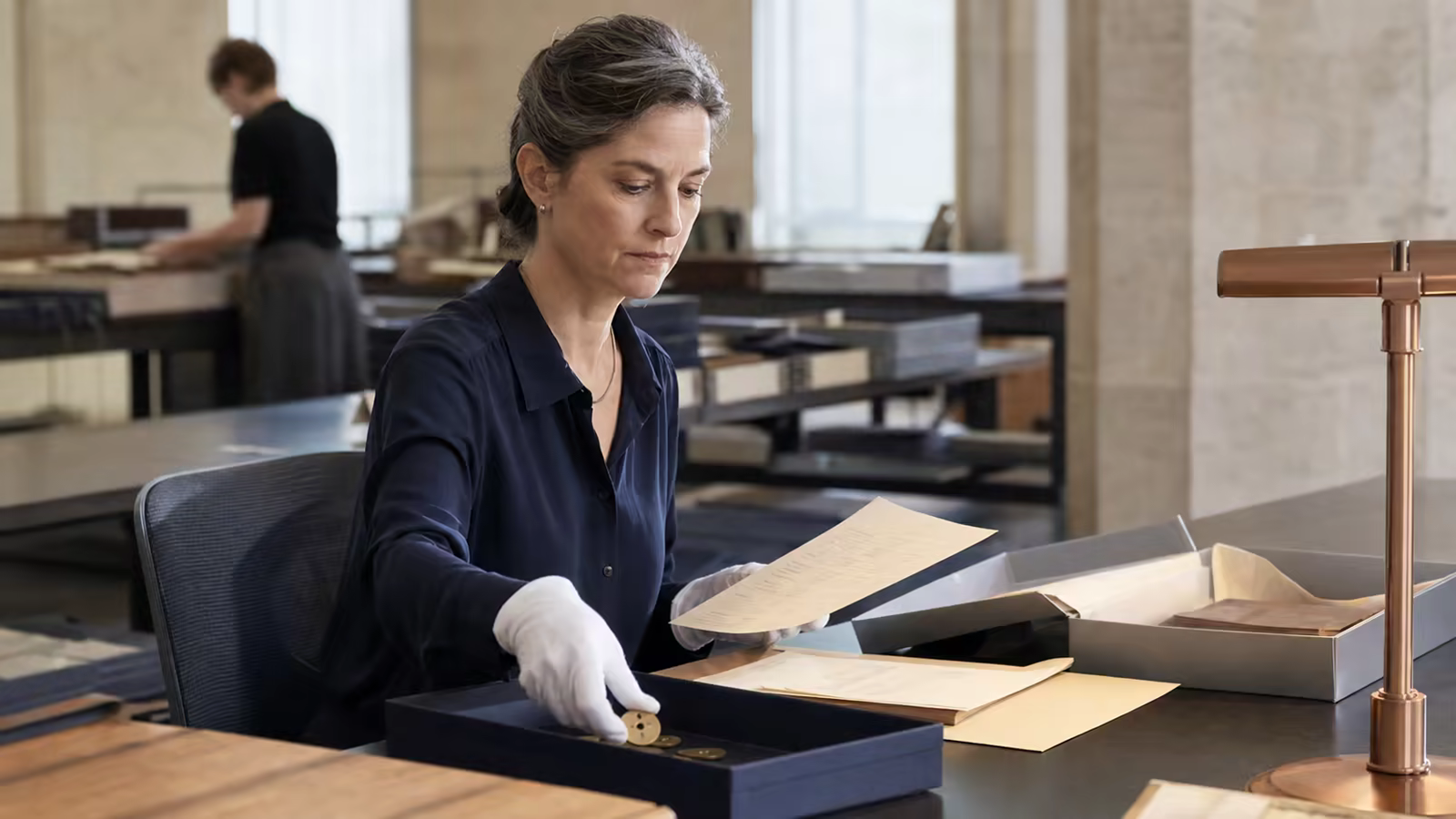 A manager checking access authorizations to archives