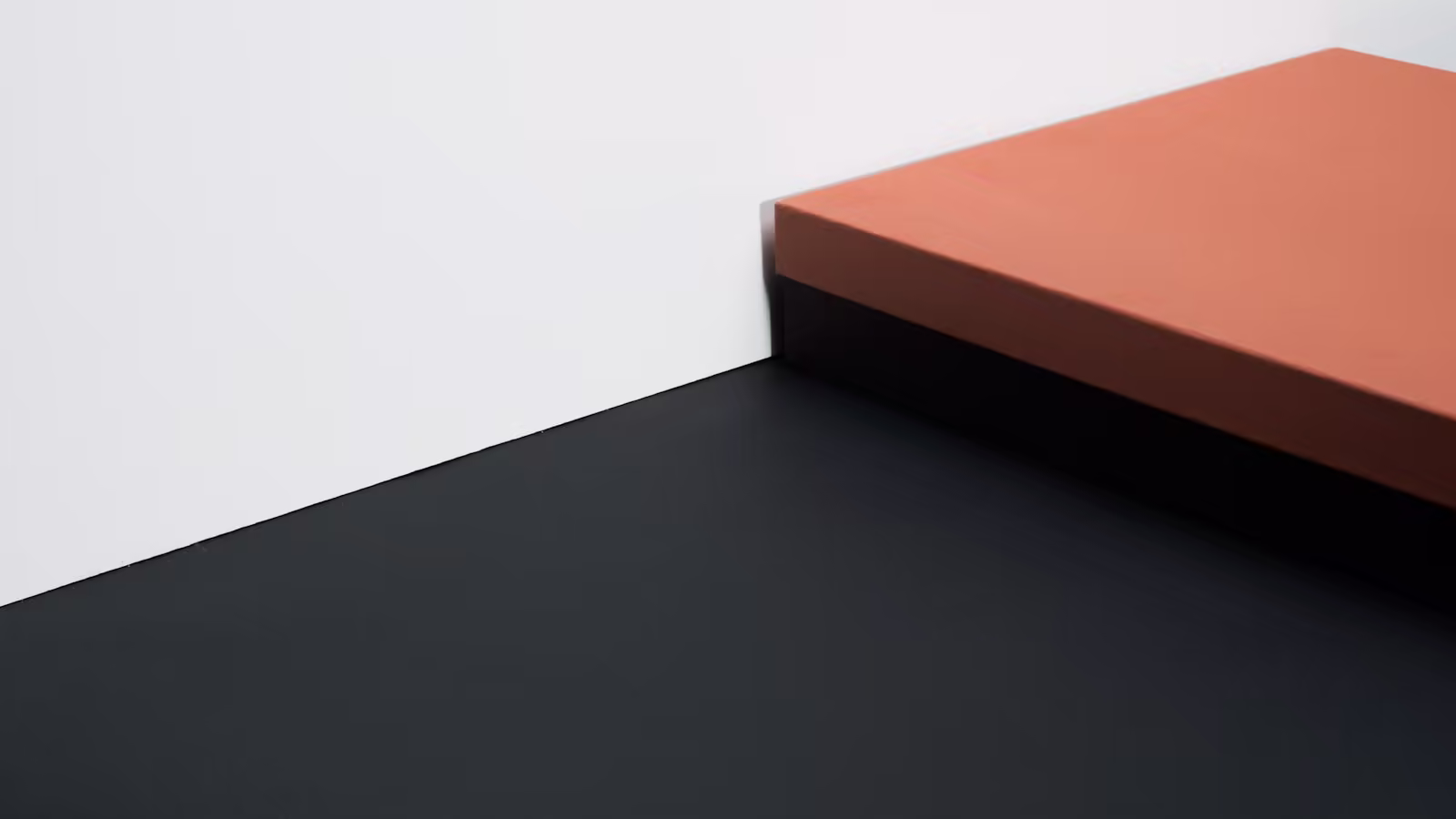 Layers of papier in a contemporary workshop evoking exploration, rendering and indexing