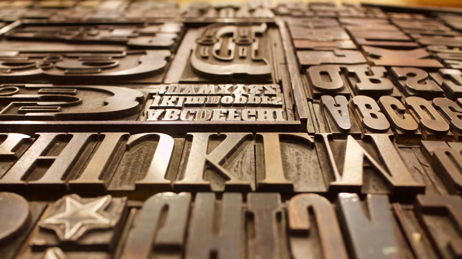 An engraver constructing a coherent series of symbols
