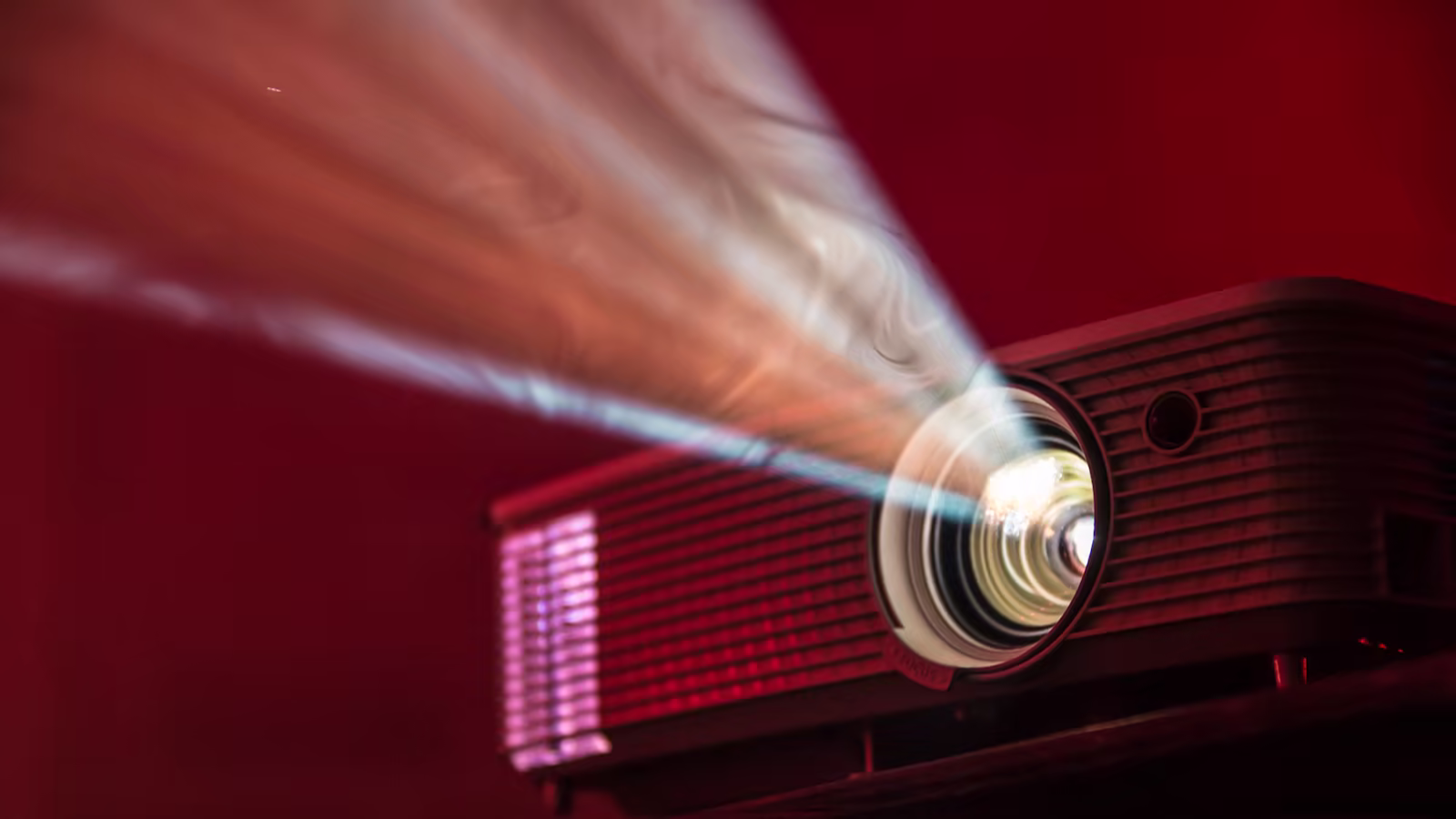 A projection beam in a contemporary cinema room