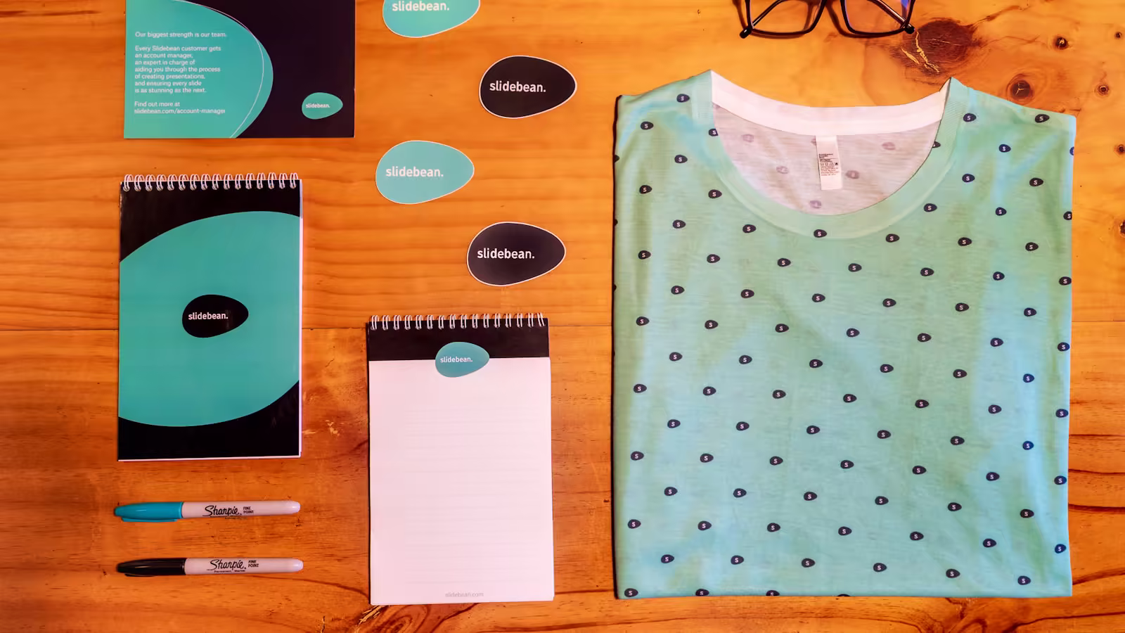 Creating a graphic identity in a studio, illustrating the move from logo to brand system.