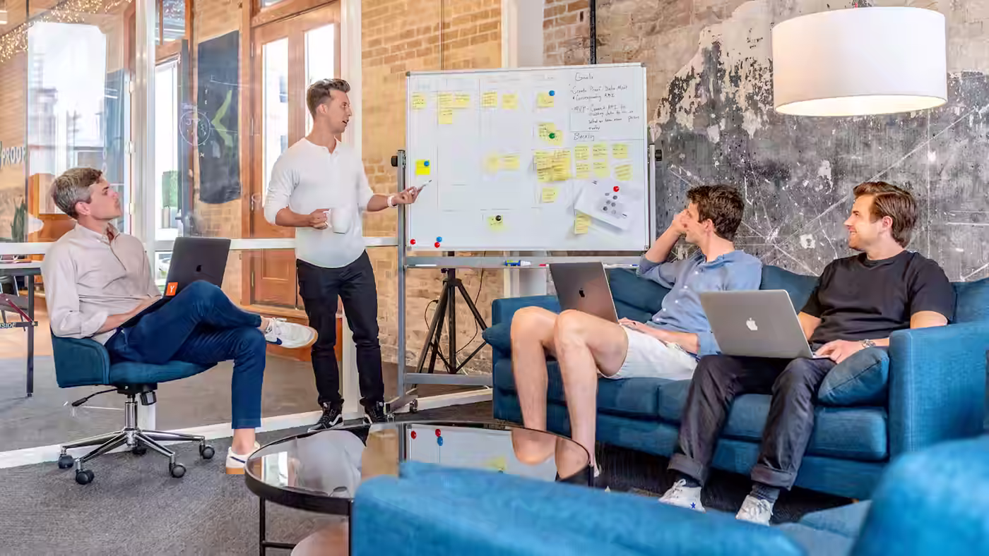 A sales team mapping their process in a sober workshop