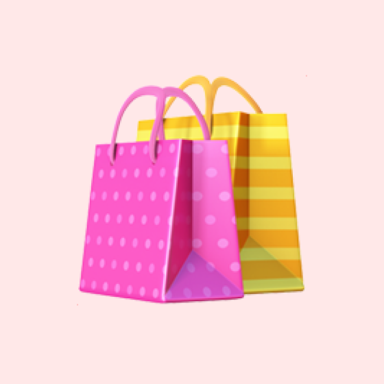 Colorful shopping bags in pink with white dots and yellow plaid pattern against a light pink background