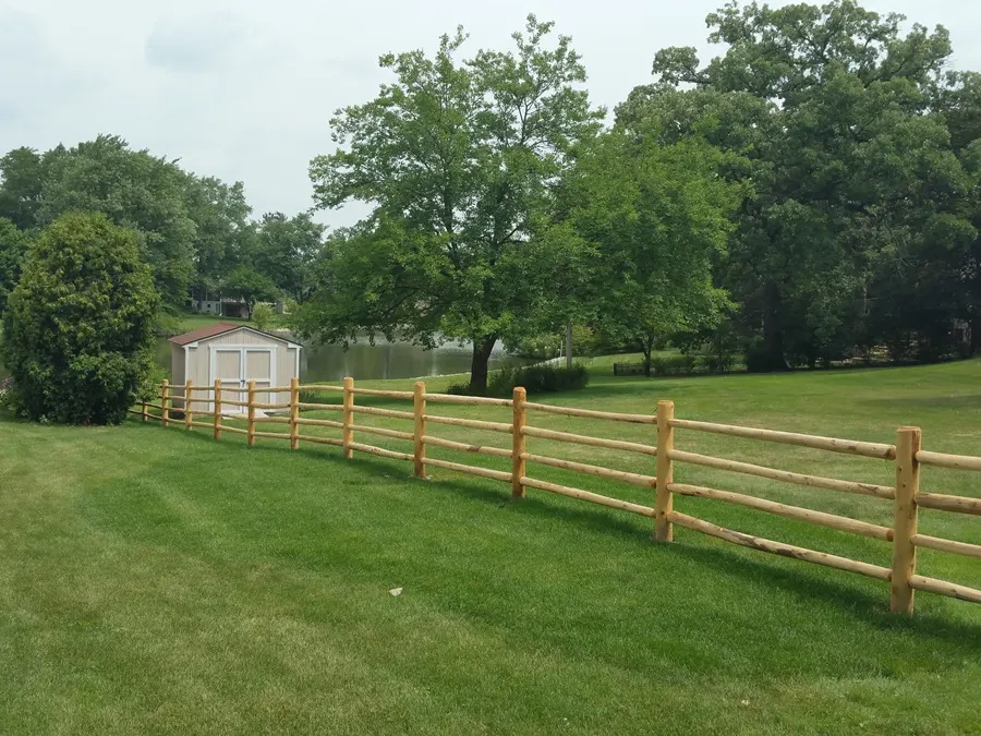 A classic cedar split rail fence with a rustic and open feel.
