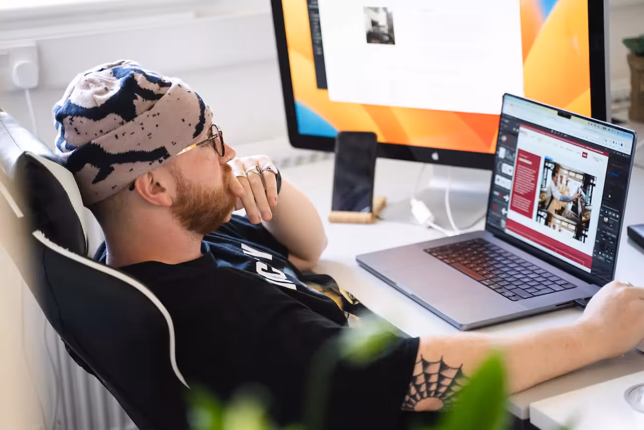 A web designer at Wizard Pi building a new website for a client. 