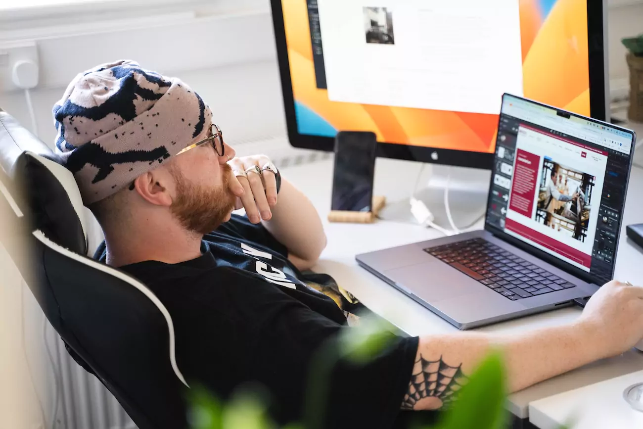 A web designer at Wizard Pi building a new website for a client. 