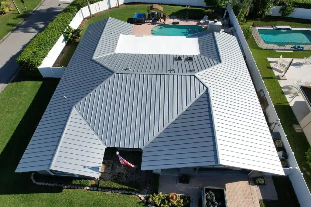 Aerial photo of light blue standing seam metal roof.