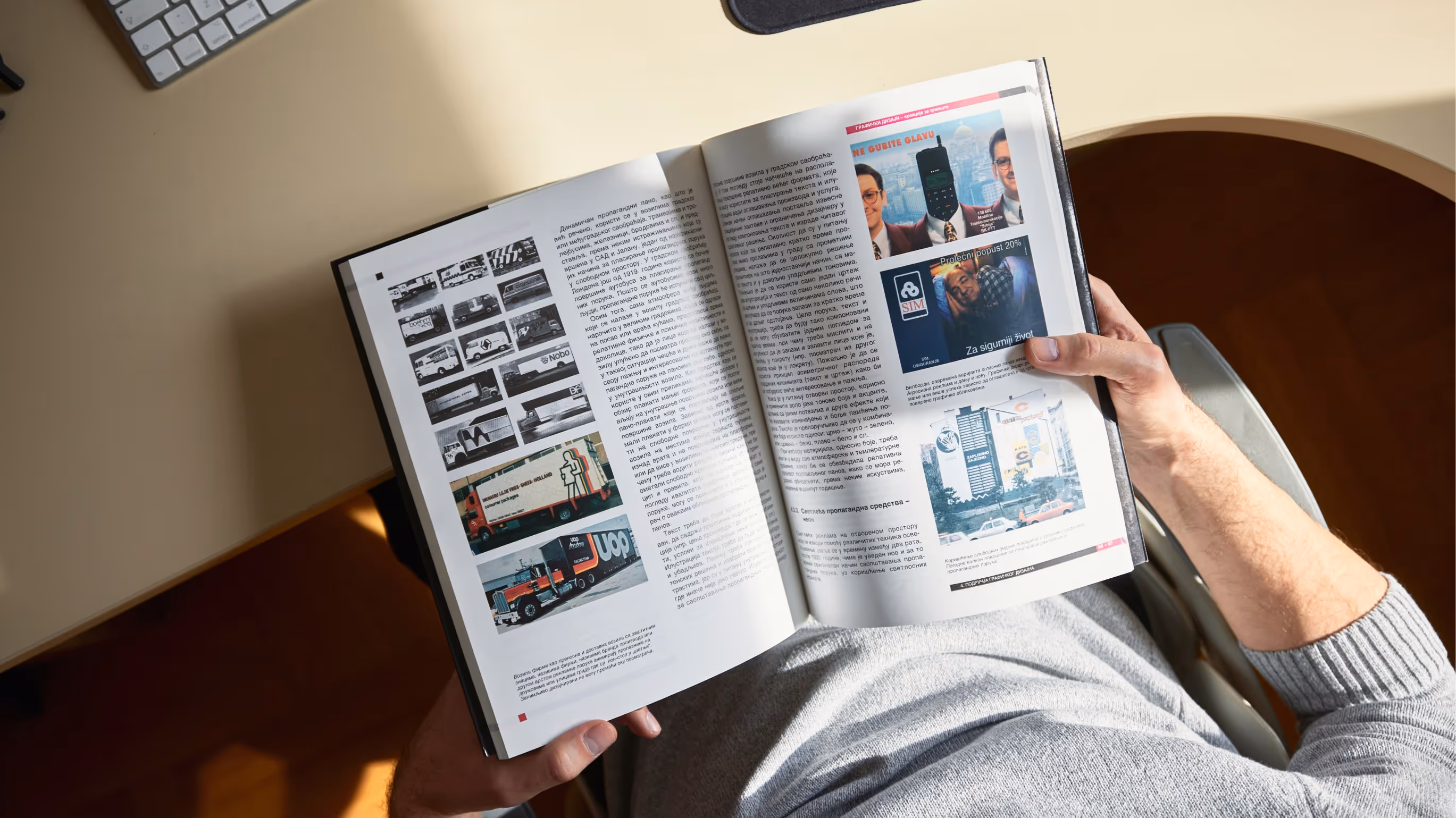 Close up shot of hands holding book