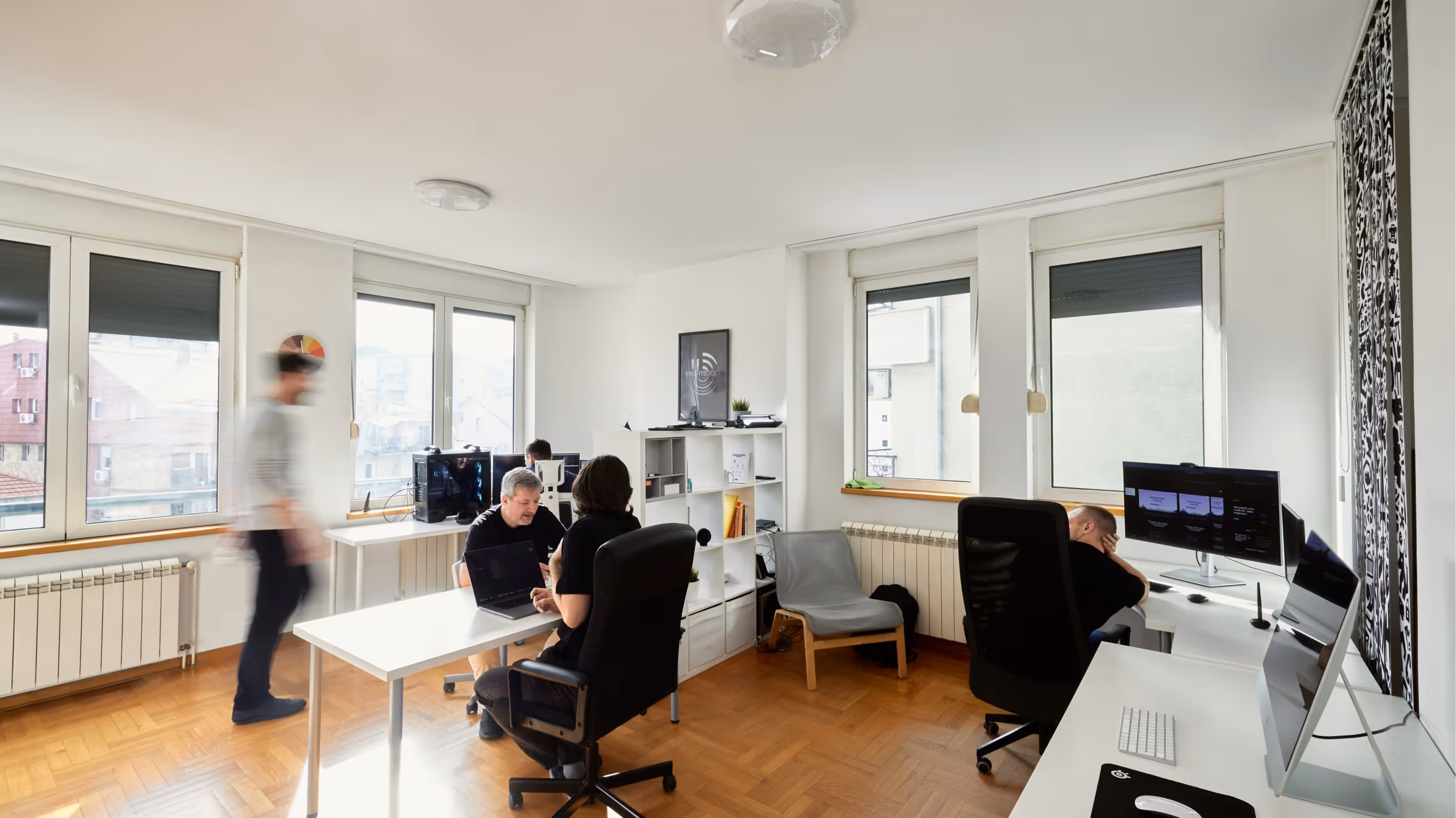 Photo of scouts working on Brightscout's Europe office