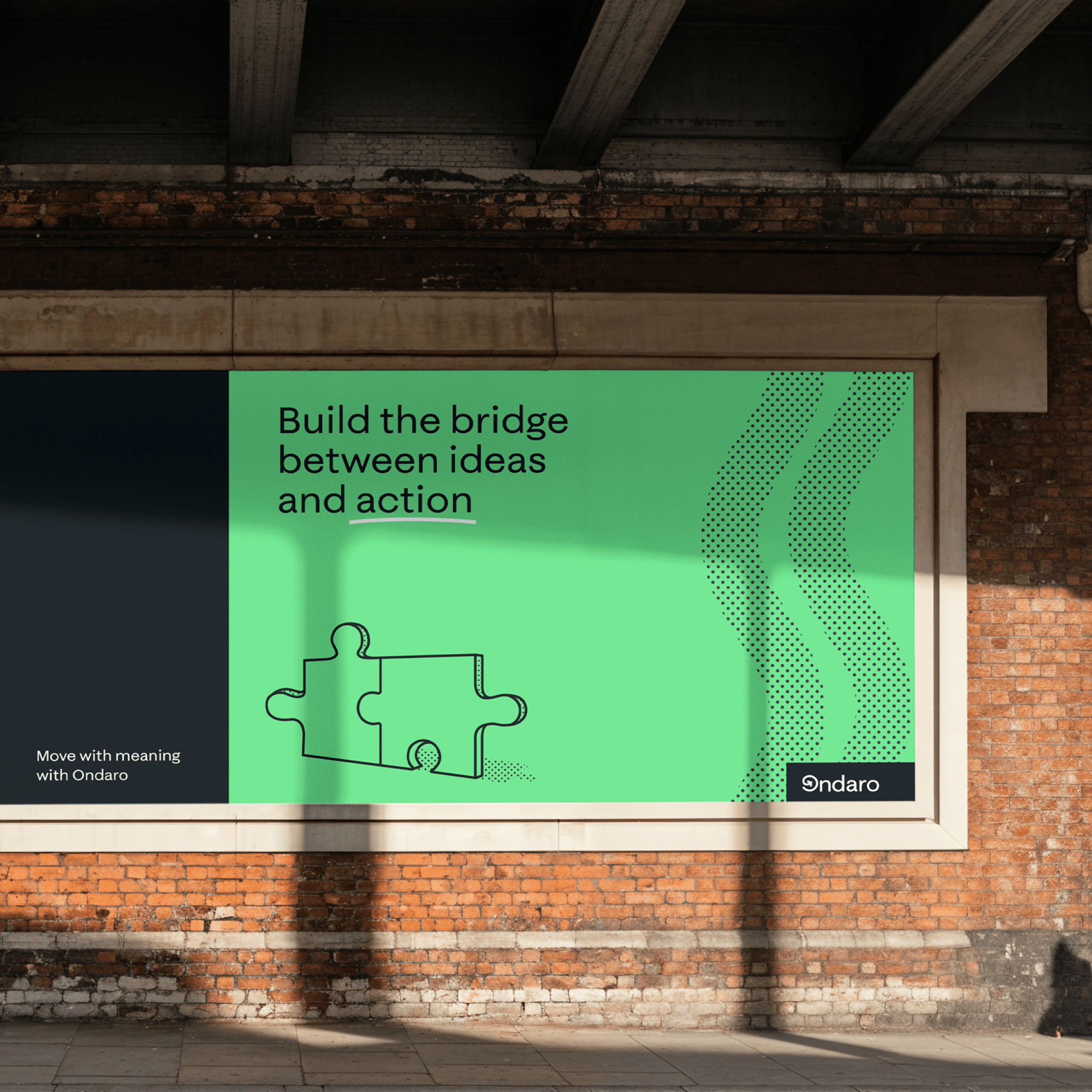 Advertisement with green and black background showing two connected puzzle pieces and the text 'Build the bridge between ideas and action' with Ondaro branding.
