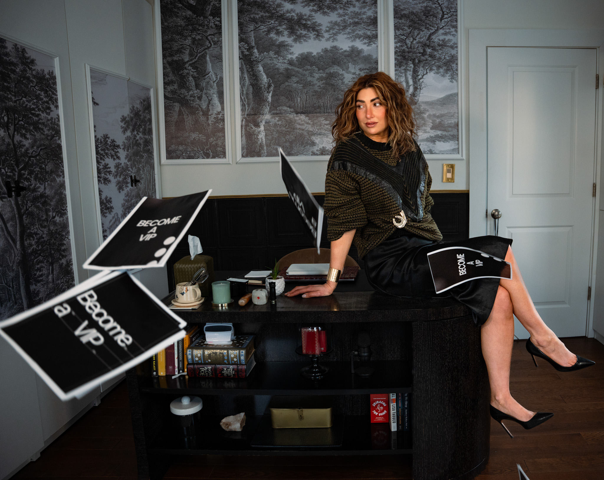 Abstract metallic sculpture with a reflective chrome surface, shaped into an organic, fluid form resembling a distorted head or face, against a solid black background. Represents Elementsist’s theme of branding alchemy, symbolizing transformation and fluid creativity.