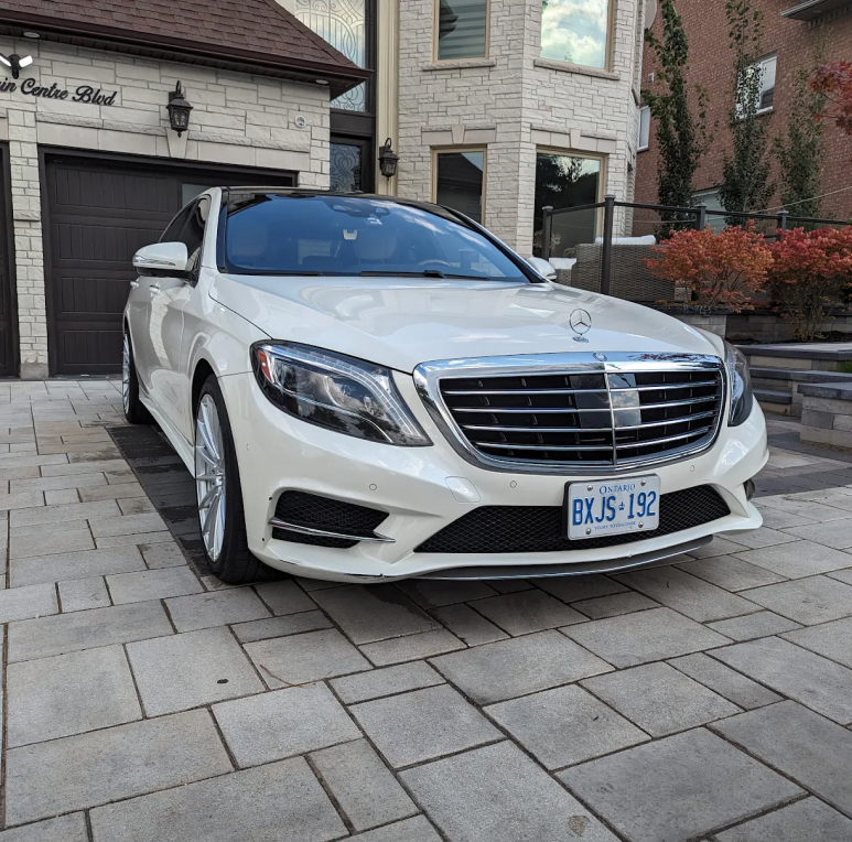 A white mercedes benz 