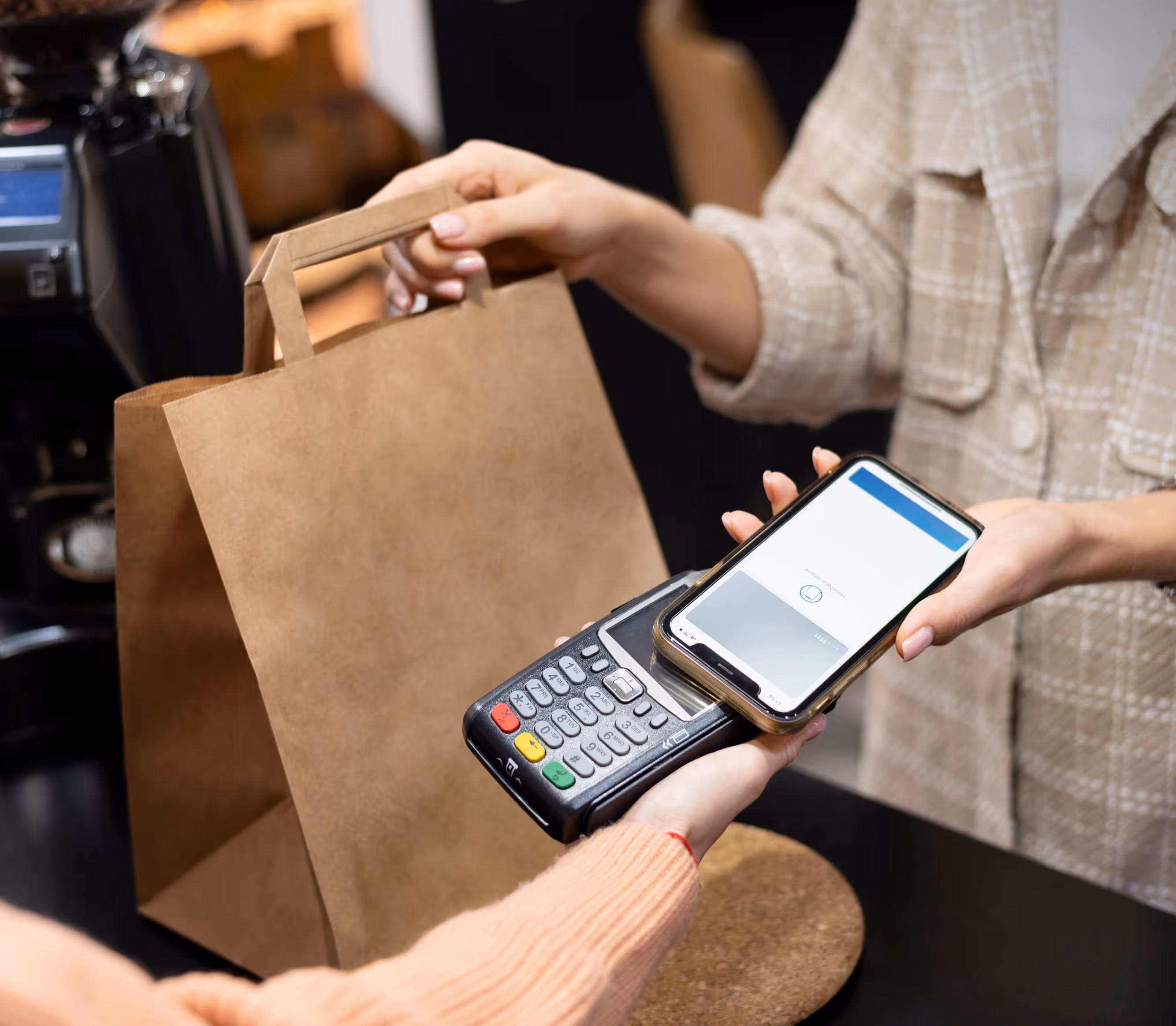 a man doing payment through his mobile