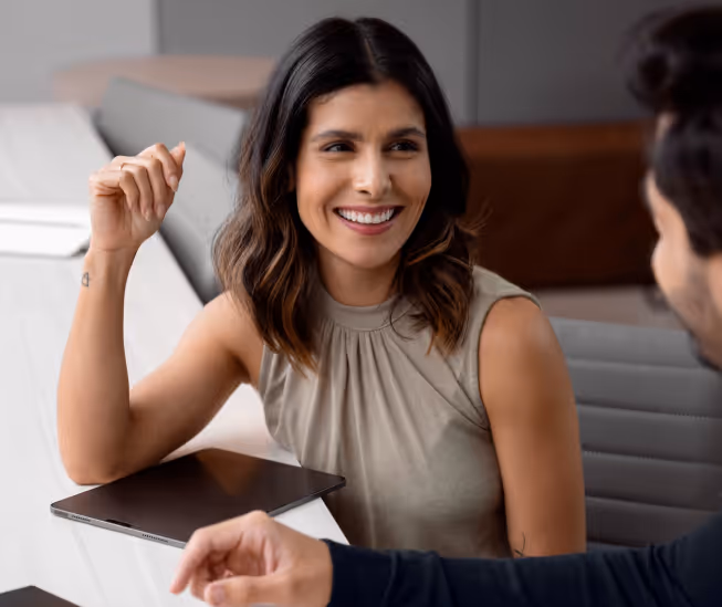man and woman using tablet