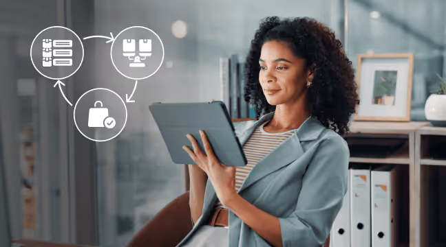 Person holding a tablet displaying charts and graphs with an infinity symbol overlay containing a blue droplet and a colorful paper airplane.