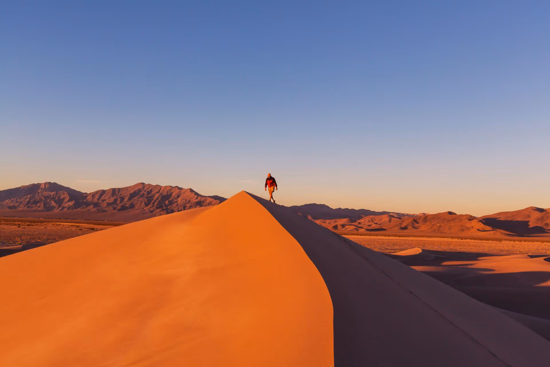 hiker sand desert sunrise time