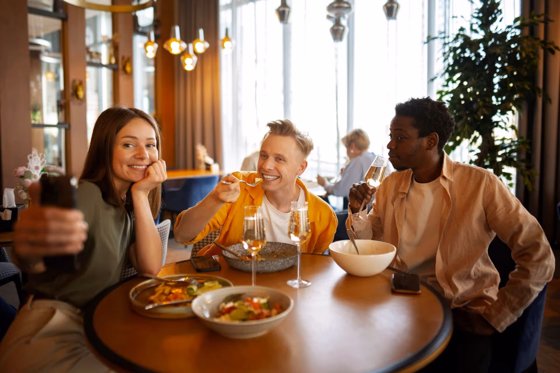 friends having lunch together restaurant