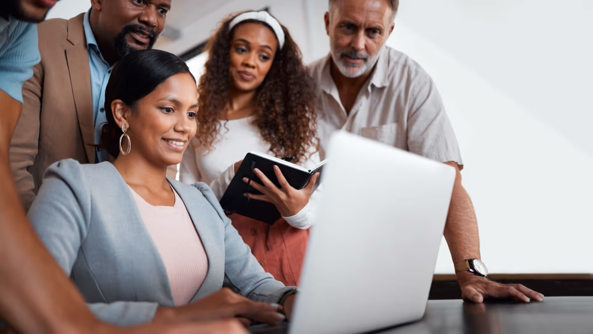 group business people planning together on laptop