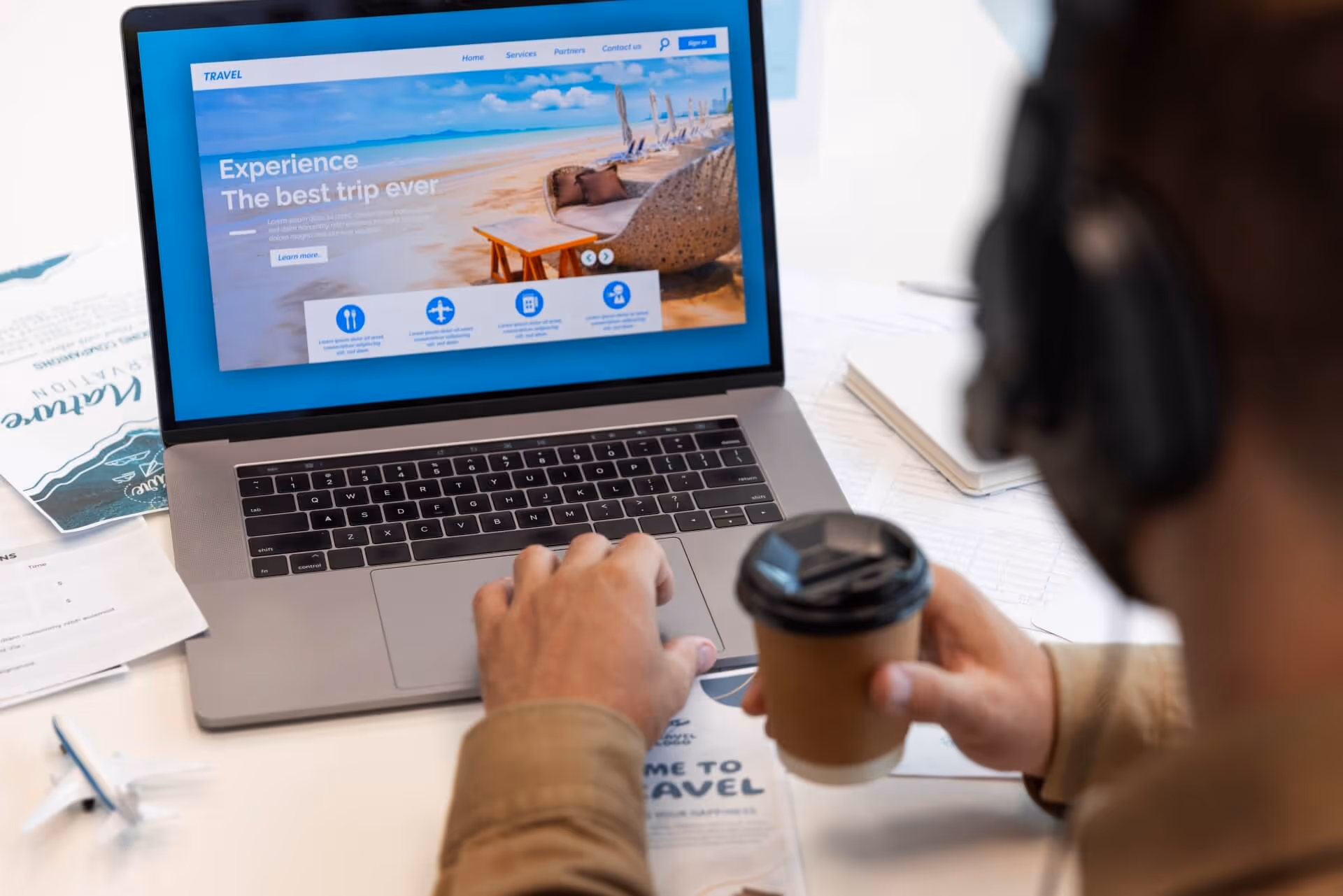 Laptop with travel website