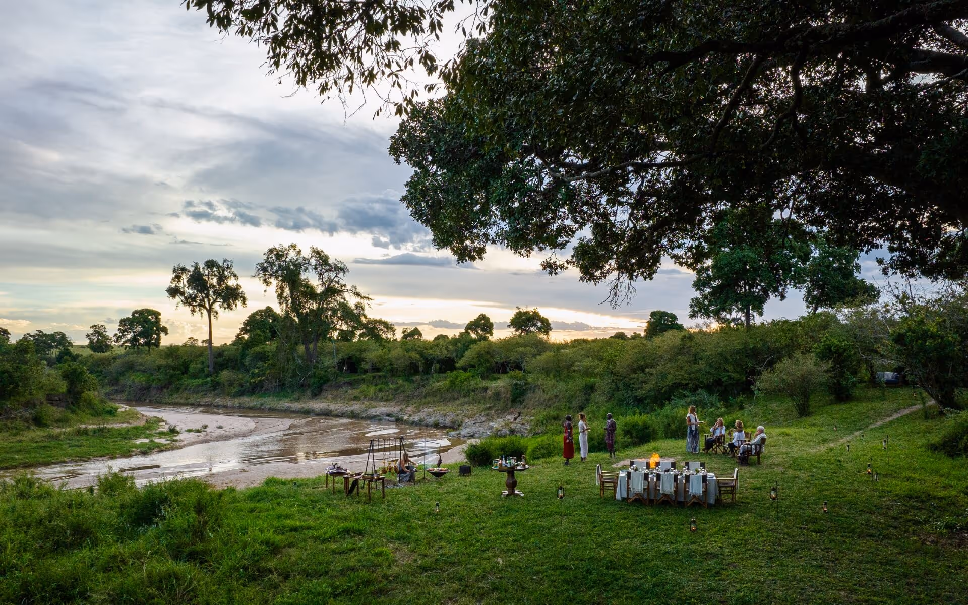 Family enjoy a picnic on their travel