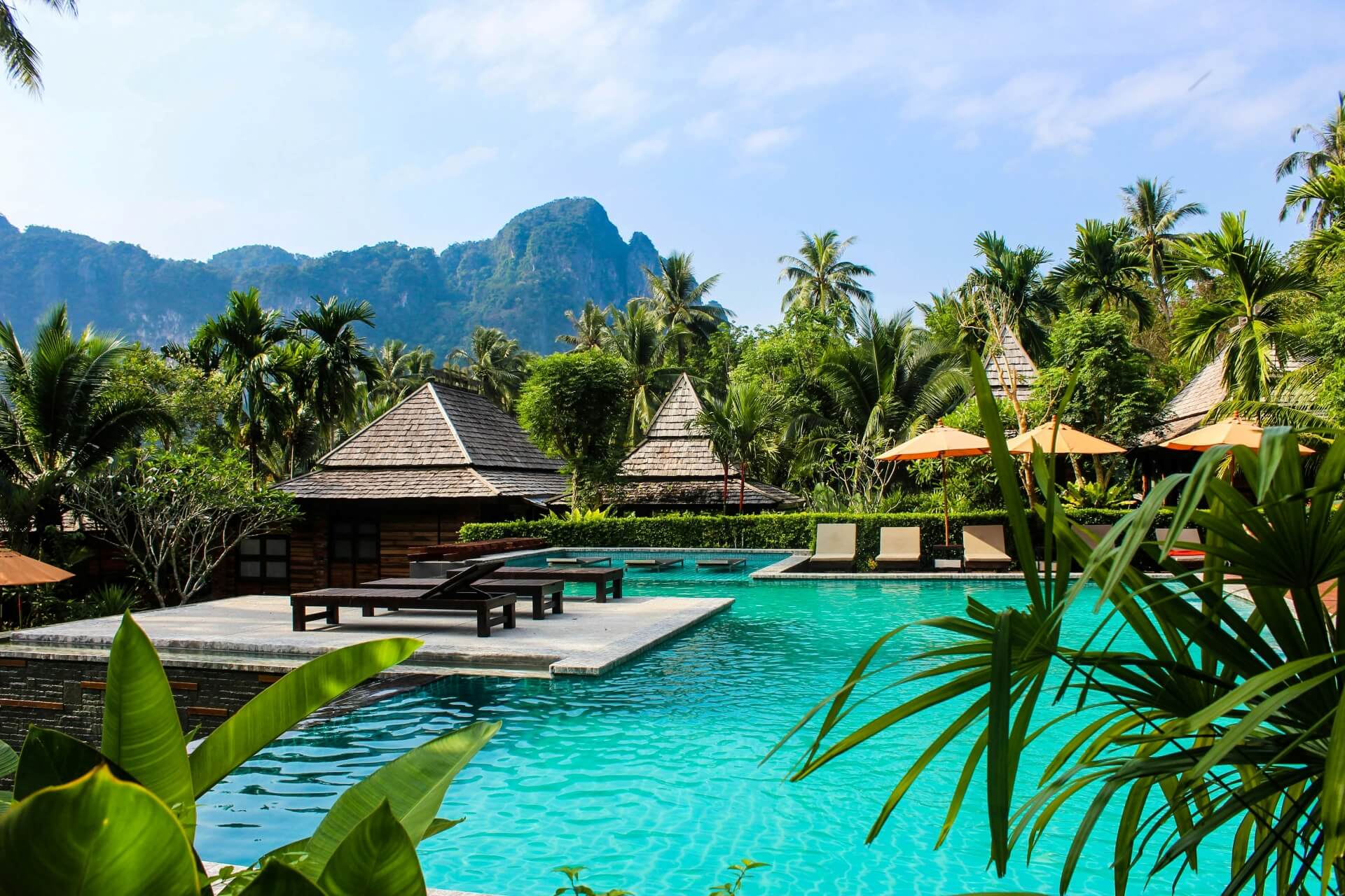 Secluded tropical luxury resort with mountains in the background