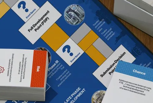 Physical game involving customized cards.