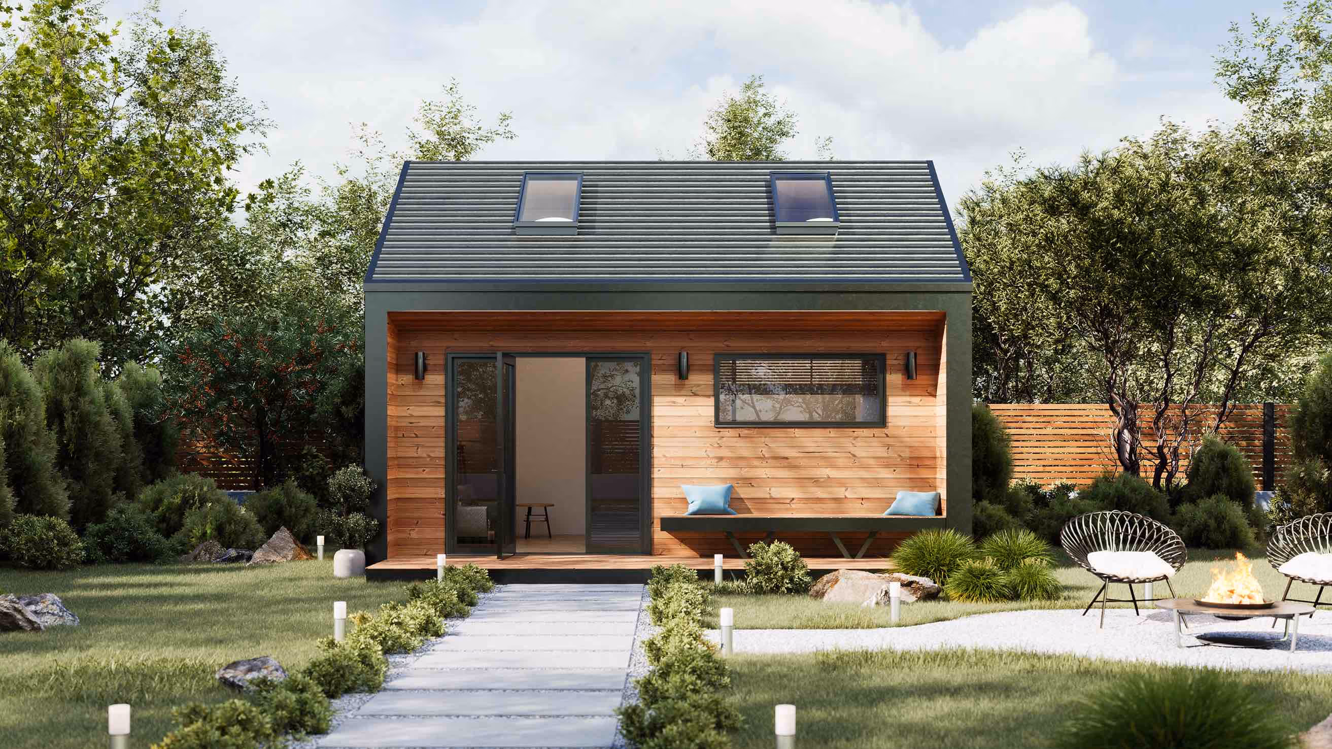 Small Prefabricated ADU with pitched roof and mezzanine floor in a nice backyard around trees