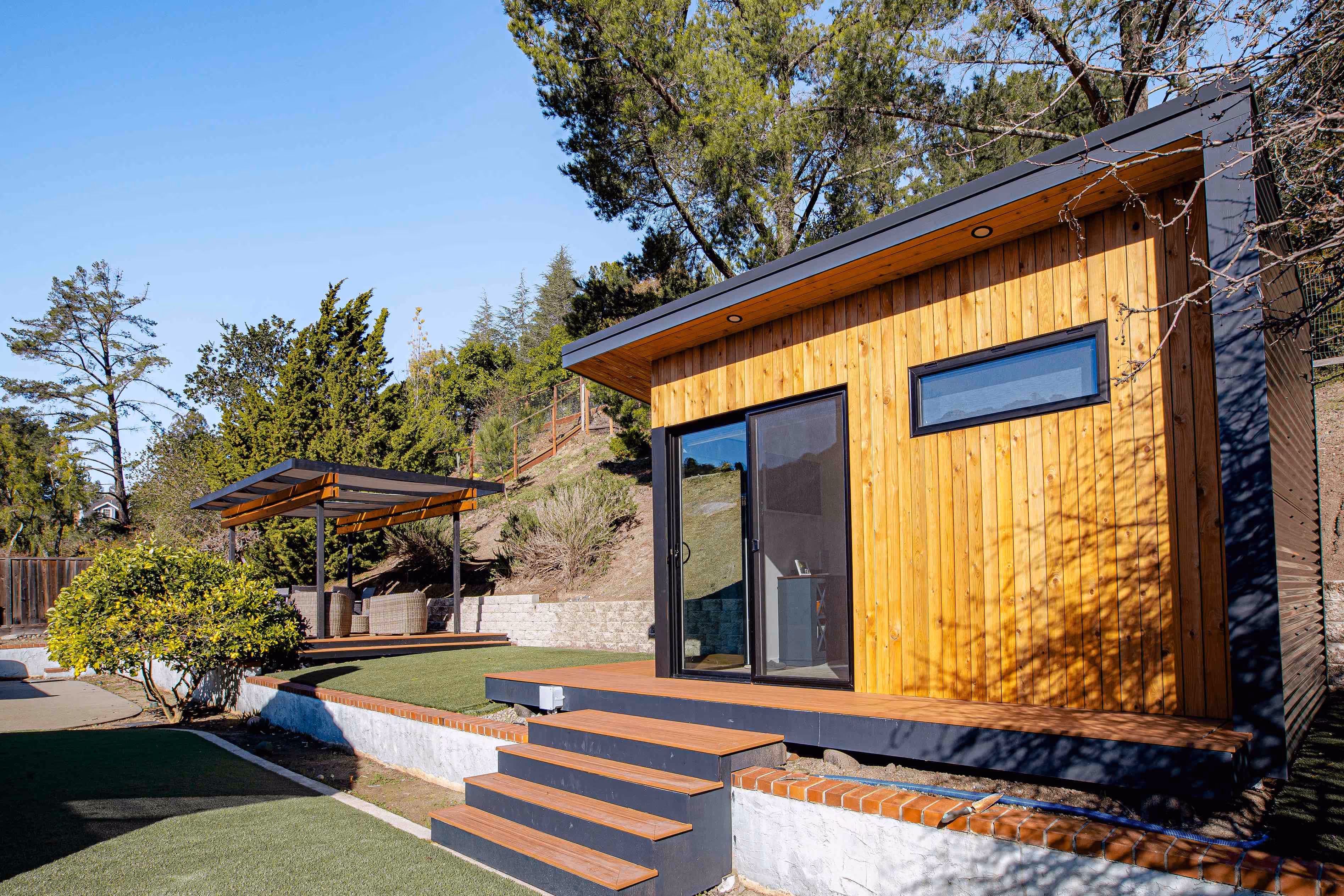Exterior view of a modern prefab shed.
