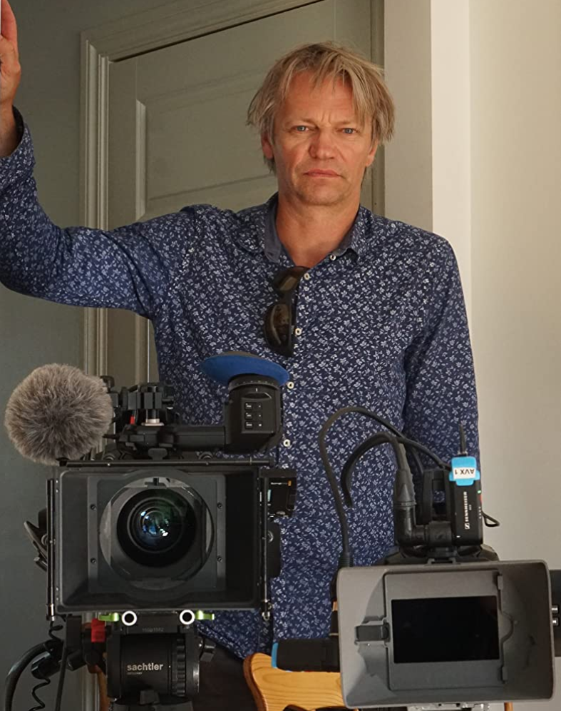 The Norwegian producer Bjørn Eivind Aarskog stands behind video equipment