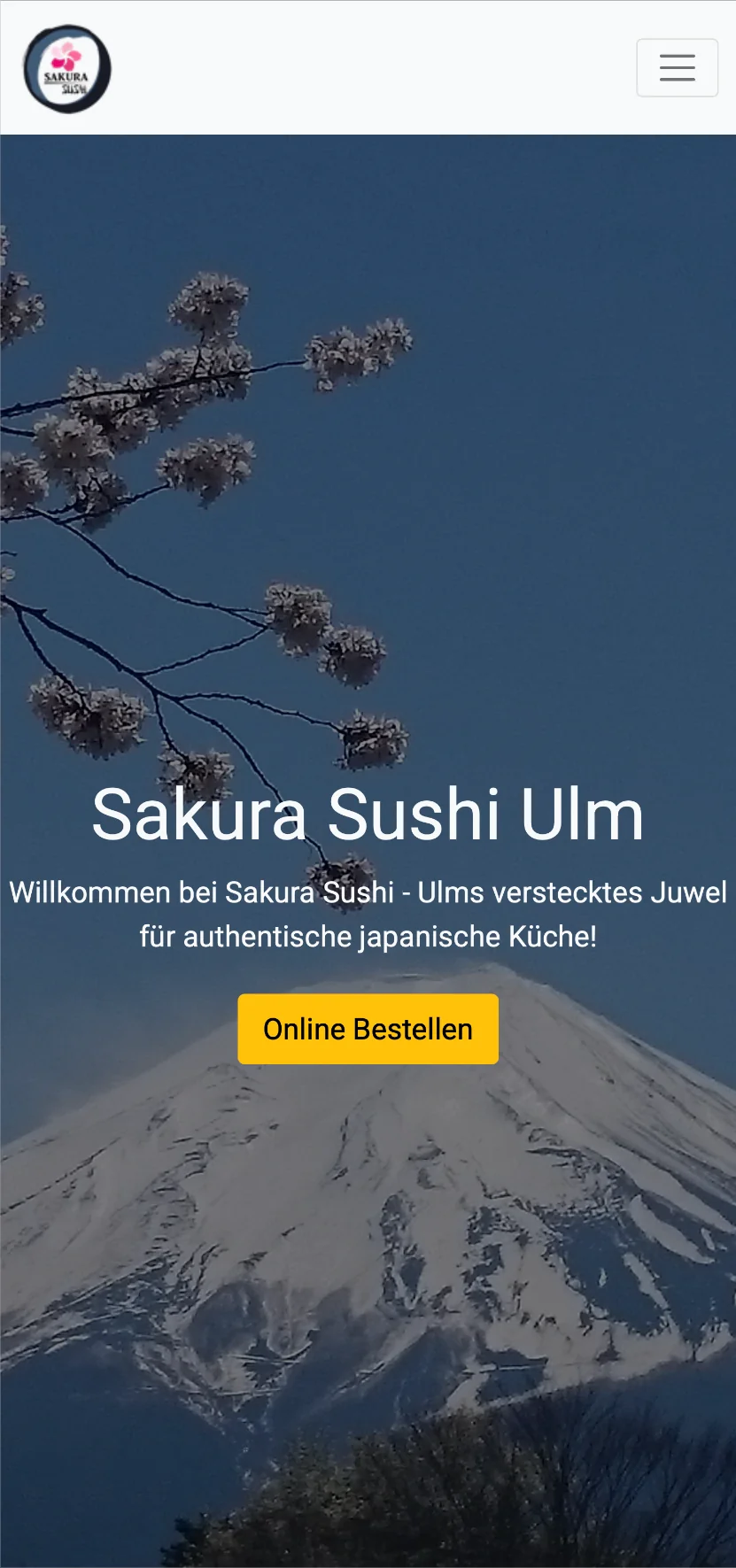 Alte Website von Sakura Sushi Ulm mit schlichter Startseite und Kirschblütenhintergrund